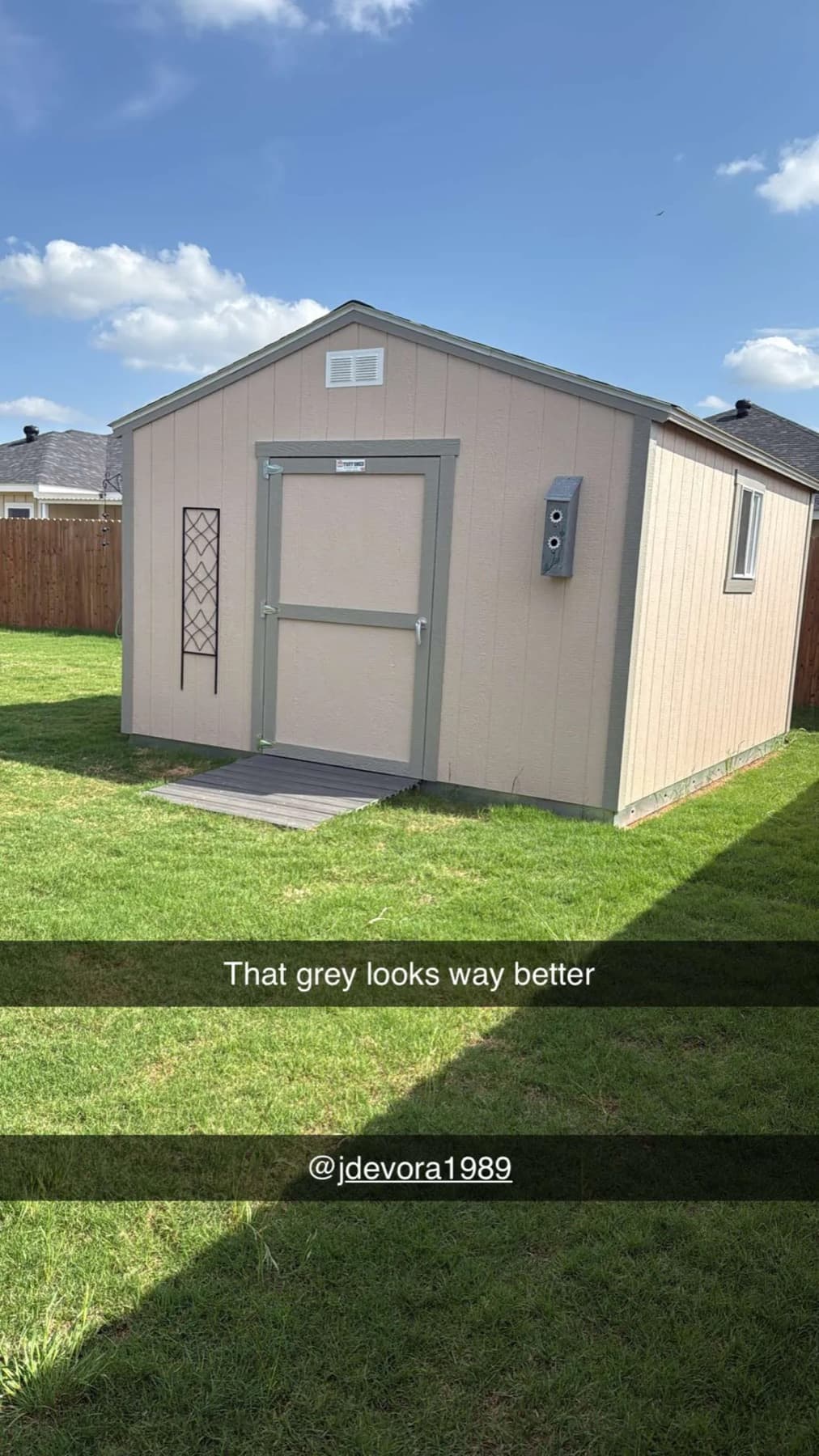 Backyard shed after gray trim color change